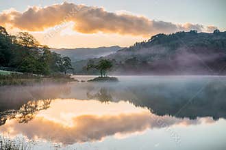 Mirrored sunrise on Rydal Water, in the Lake District