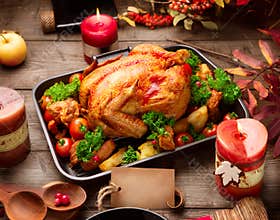 Roasted turkey garnished with potato. Thanksgiving or Christmas dinner