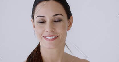 Lovely young woman with a genuine natural smile