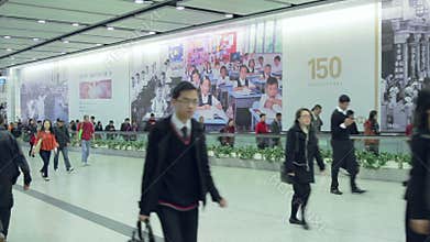 China, Hong Kong - 04 March 2015: People in Subway Transition Tunnel