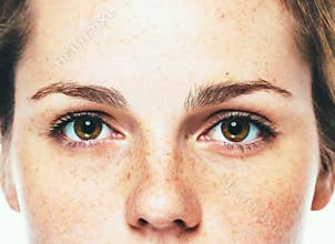 Eyes woman freckle happy young beautiful studio portrait with healthy skin