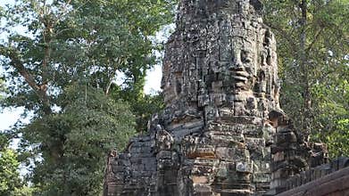 Bas-relief of the face on ancient wall in Angkor Thom temple complex, Cambodia
