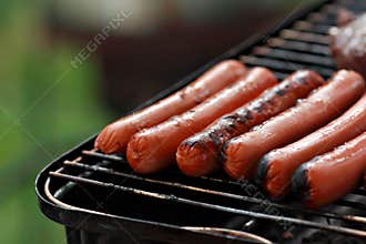 Hotdogs on grill