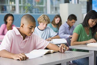 Schoolboy in high school class