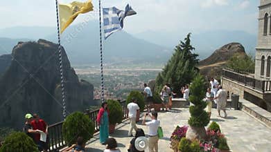 Meteora. Tourists on a viewing platform of the monastery, Greece