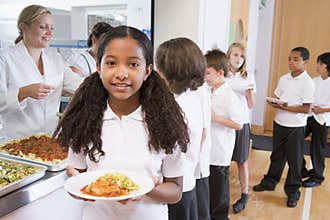 Schoolgirl in a school cafeteria
