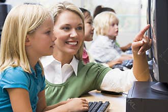 Children learn how to use computers