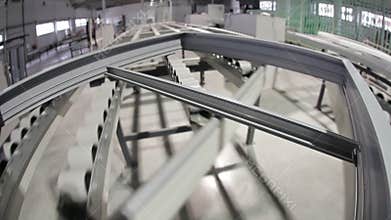 Window frame on conveyor belt in factory