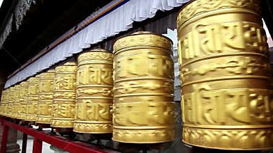 Golden prayer wheels