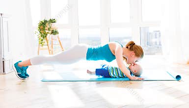 Sports mother is engaged in fitness and yoga with baby at home