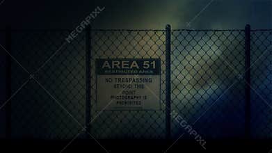 Area 51 Sign on a Metal Fence on a Stormy Night