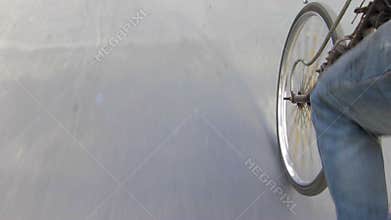 Man cycling on an old tricycle