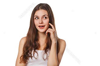 Young beautiful woman thinking looking to the side at blank copy space, isolated over white background