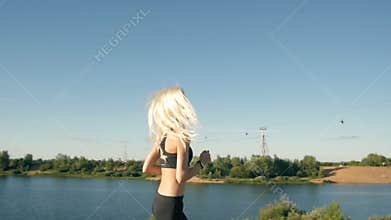 Athletic Woman Running near the Beach. Female Runner Jogging. Outdoor Workout.