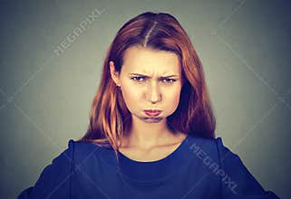 Angry woman, puffing out cheeks about to have nervous breakdown