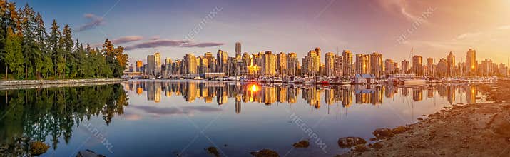 Beautiful Vancouver skyline and harbor with idyllic sunset glow, British Columbia, Canada