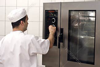 Cook at commercial stove