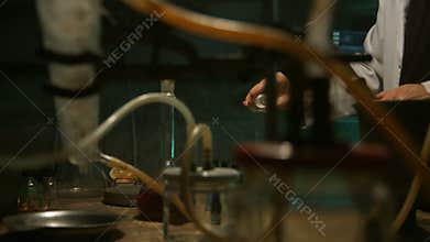 Strange scientist prepares a potion