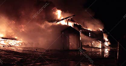 Huge fire blazing in commercial building.