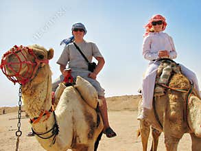 People traveling on camels in egypt