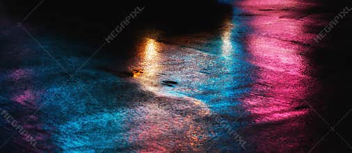 NYC streets after rain with reflections on wet asphalt