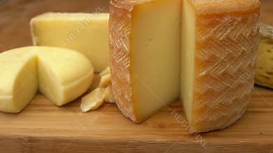 French of cheese on a wooden table.