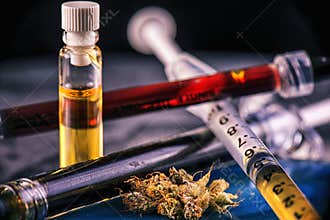 Assorted cannabis oil containers with CBD, live resin and other