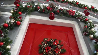 Broaching view of the door decorated for Christmas