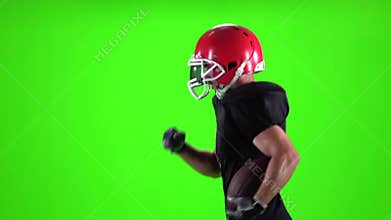 Athlete runs and throws the ball. Slow motion. Green screen