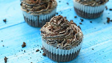 Homemade cupcakes with tender chocolate cream