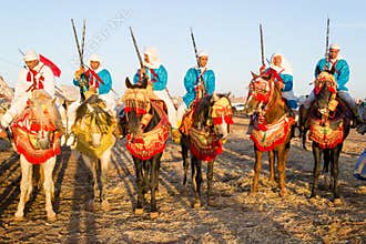 Moroccan horse riders during fantasia festival