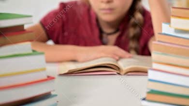 Little girl enjoy reading her book and smiling