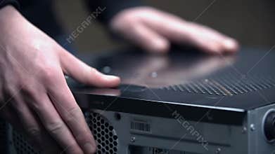 Removing side cover of personal computer in slow motion