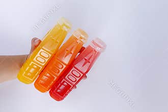 Fresh juice from fruit and vegetables isolated in box