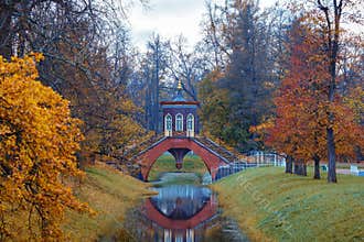 Autumn landscape with a Cross bridge.