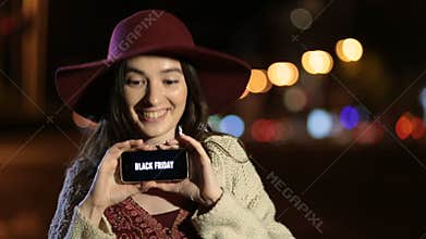 Black friday sale text on mobile phone screen