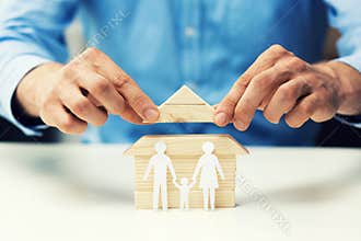 house mortgage concept - salesman help family to get new home