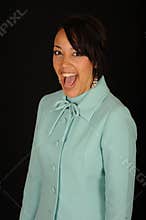 Laughing woman in aqua dress