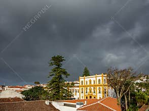 Angra do Heroismo roofs and stormy clouds in Azores islands