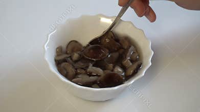 Marinated mushrooms in plate