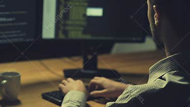 Serious hacker launching a cyber attack