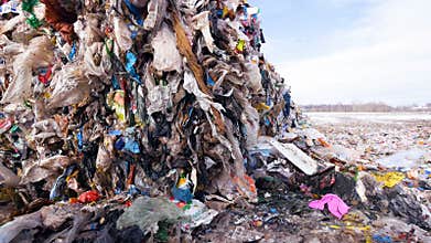 Garbage at the junkyard. Steadicam shooting. Junkyard.