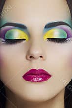 Beautiful woman with colourful makeup