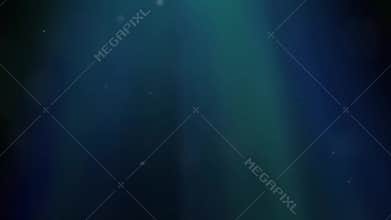 Deep ocean with sunshine and rays underwater with particles and planktonic