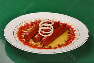 Hot dogs in sauce
