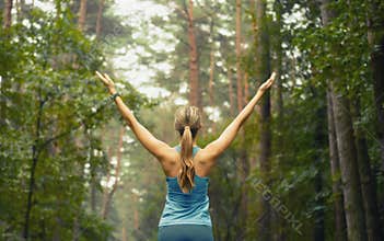 Healthy lifestyle fitness sporty woman early in forest area