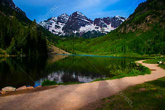 Infamous Maroon Bells of Aspen Colorado with Walking Path and reflection