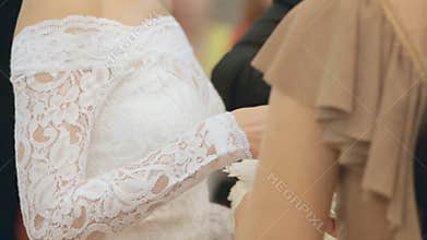 Exchange of wedding rings at wedding ceremony
