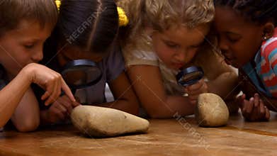 Cute pupils in classroom at school