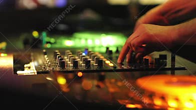Dj mixing at the night club